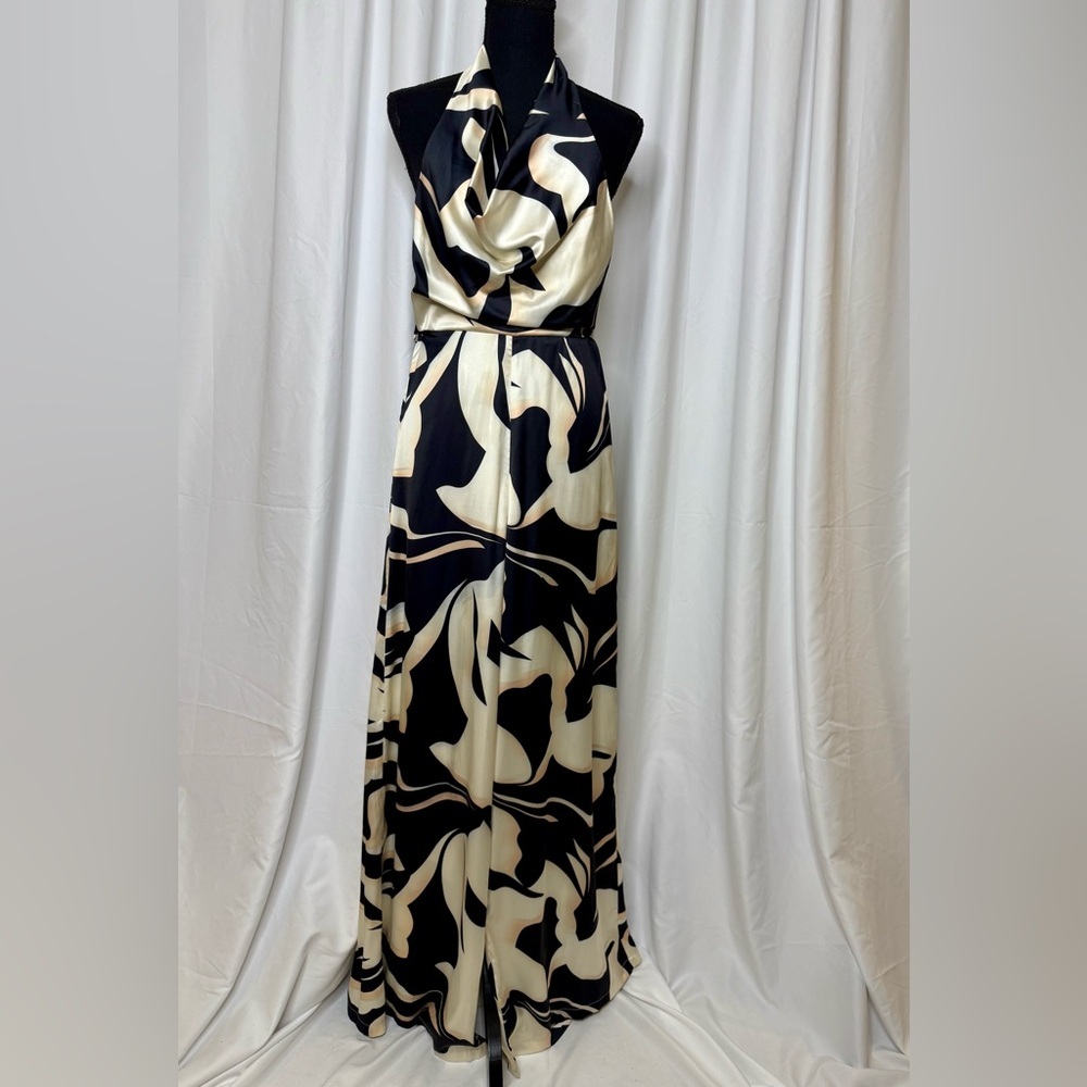 NWOT Chic Black and Cream Halter pantsuit.